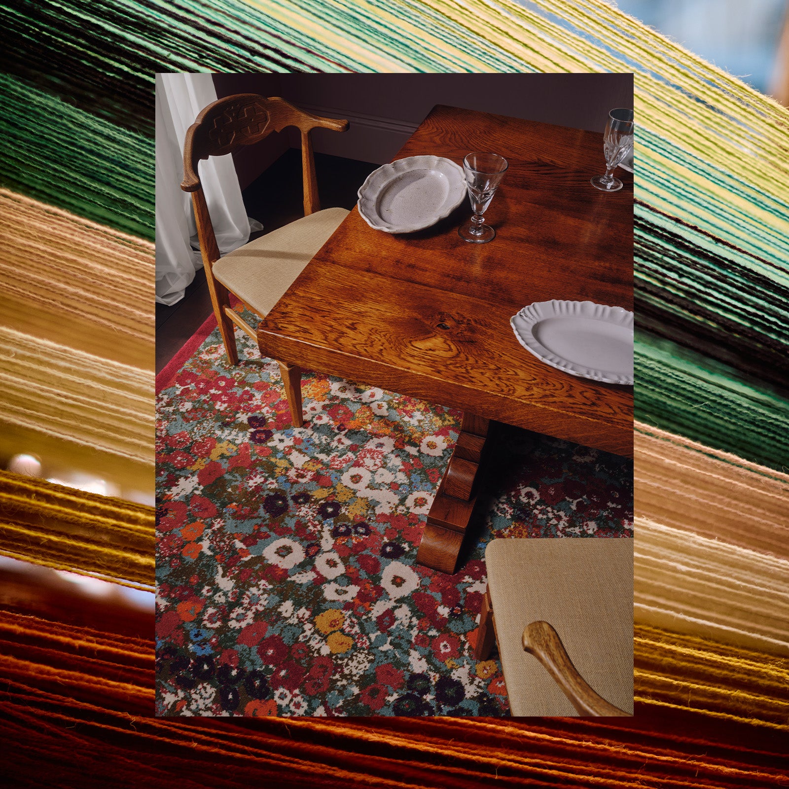 a table with plates and chairs on a colorful rug
