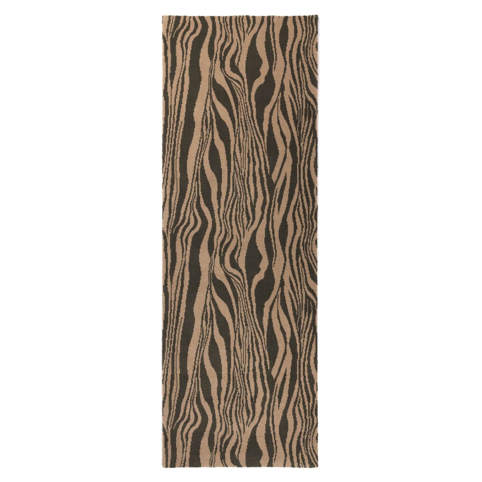 a brown and black striped rug