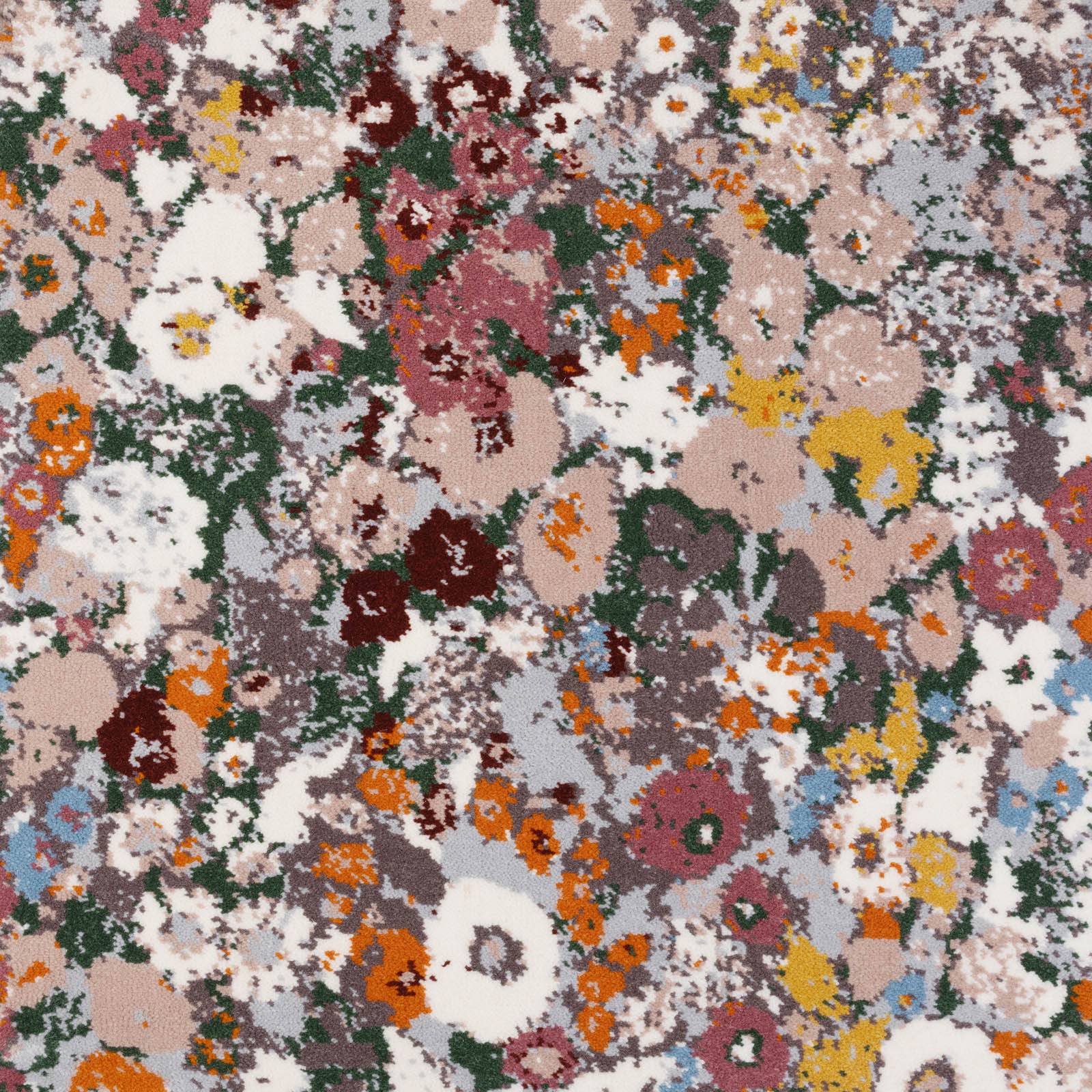a colorful floral pattern on a white surface