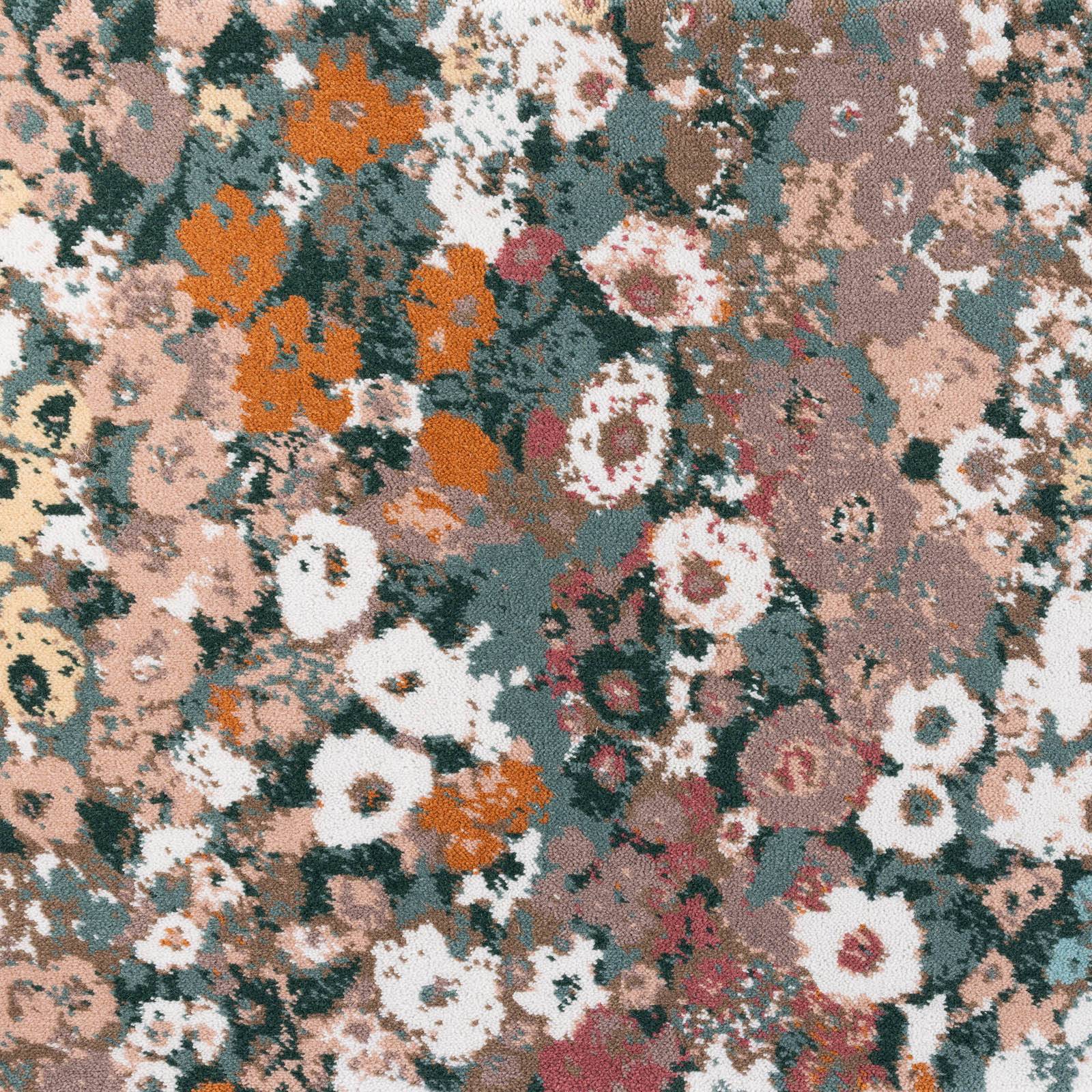 a colorful floral pattern on a rug