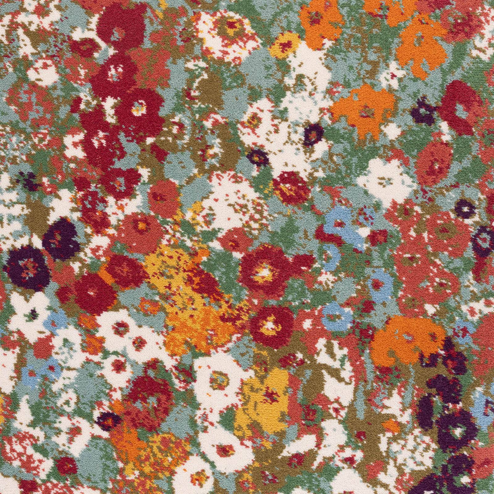 a colorful floral pattern on a carpet