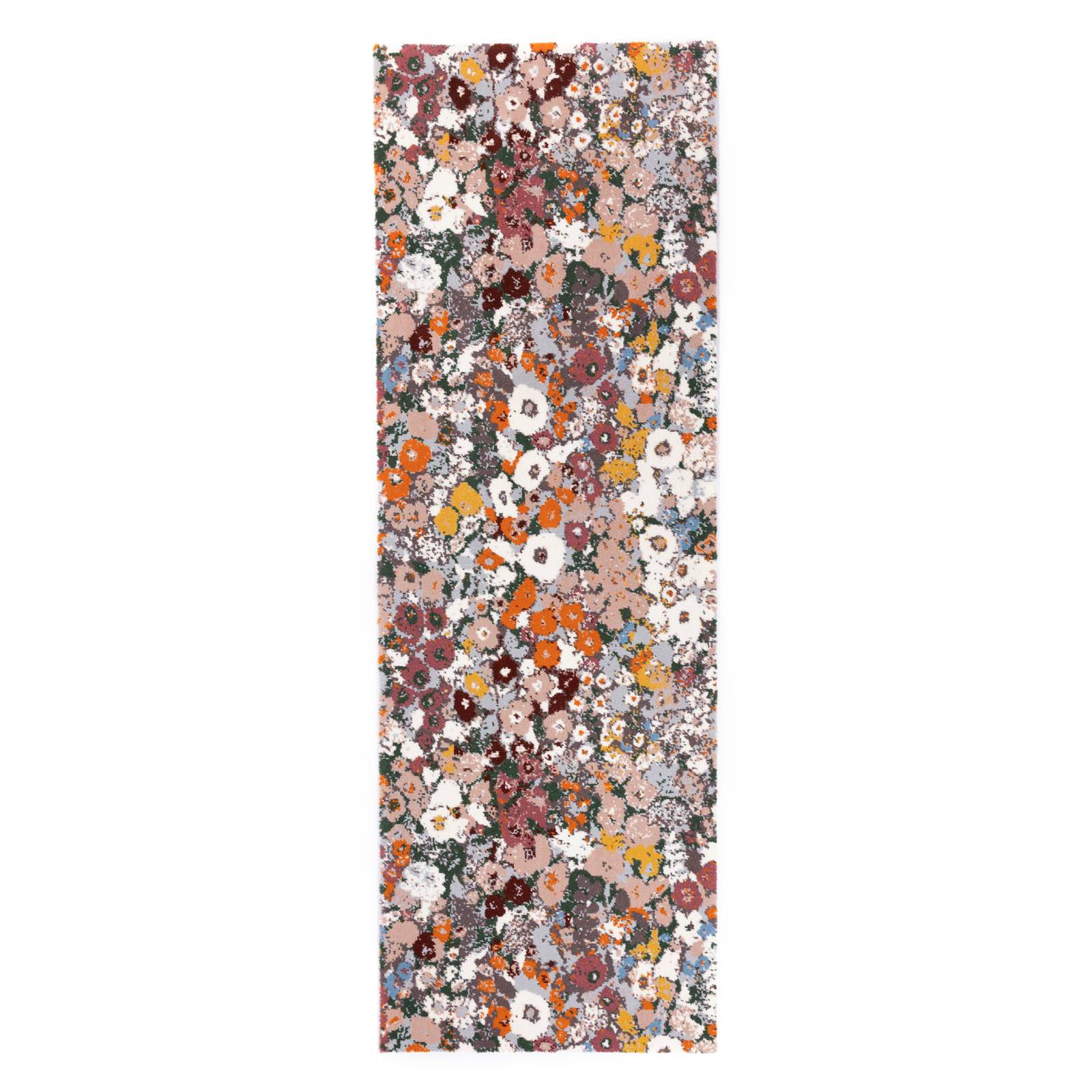 a colorful flower pattern on a white background