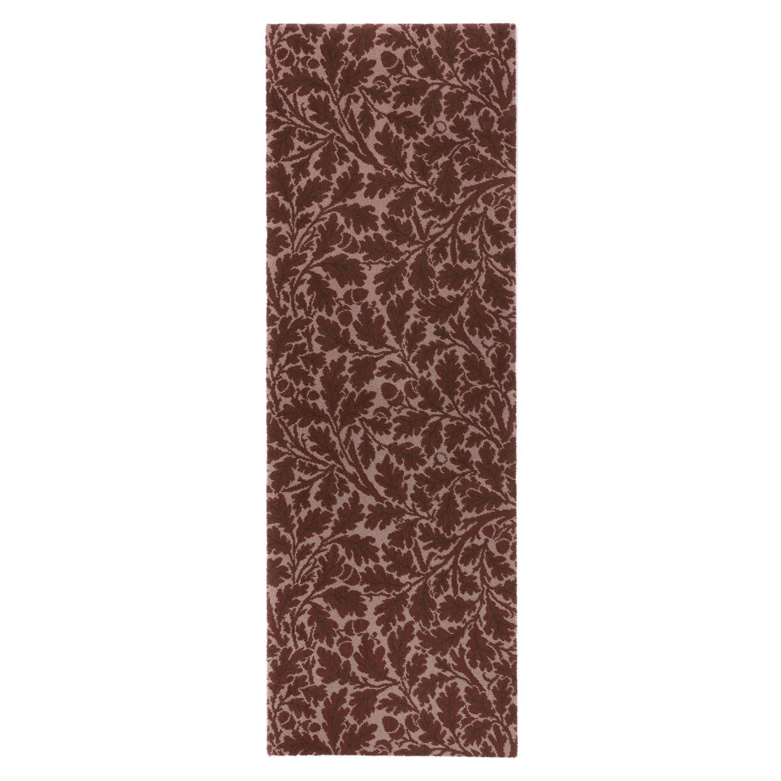 a brown and white rectangular rug