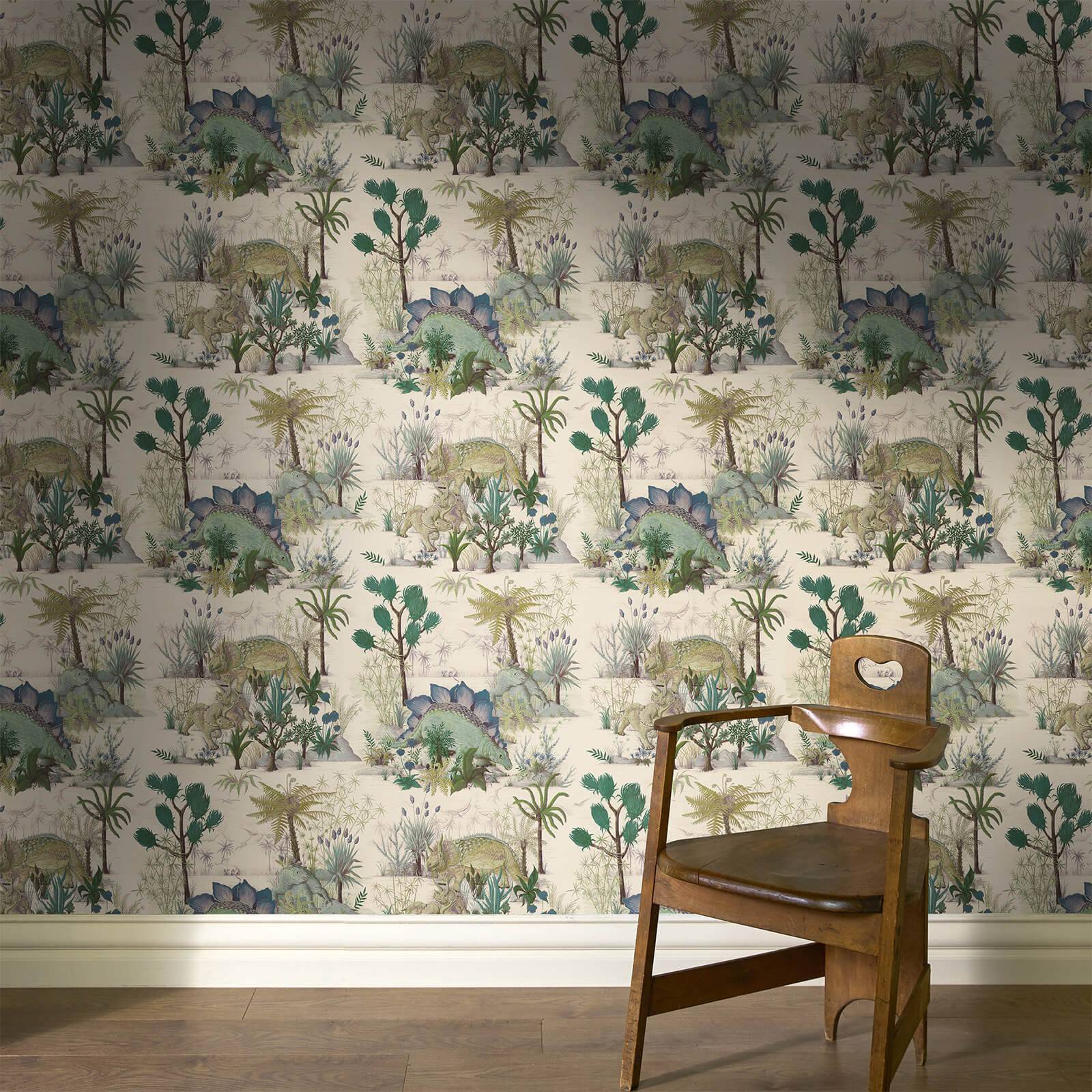 a chair in a room with a wallpaper