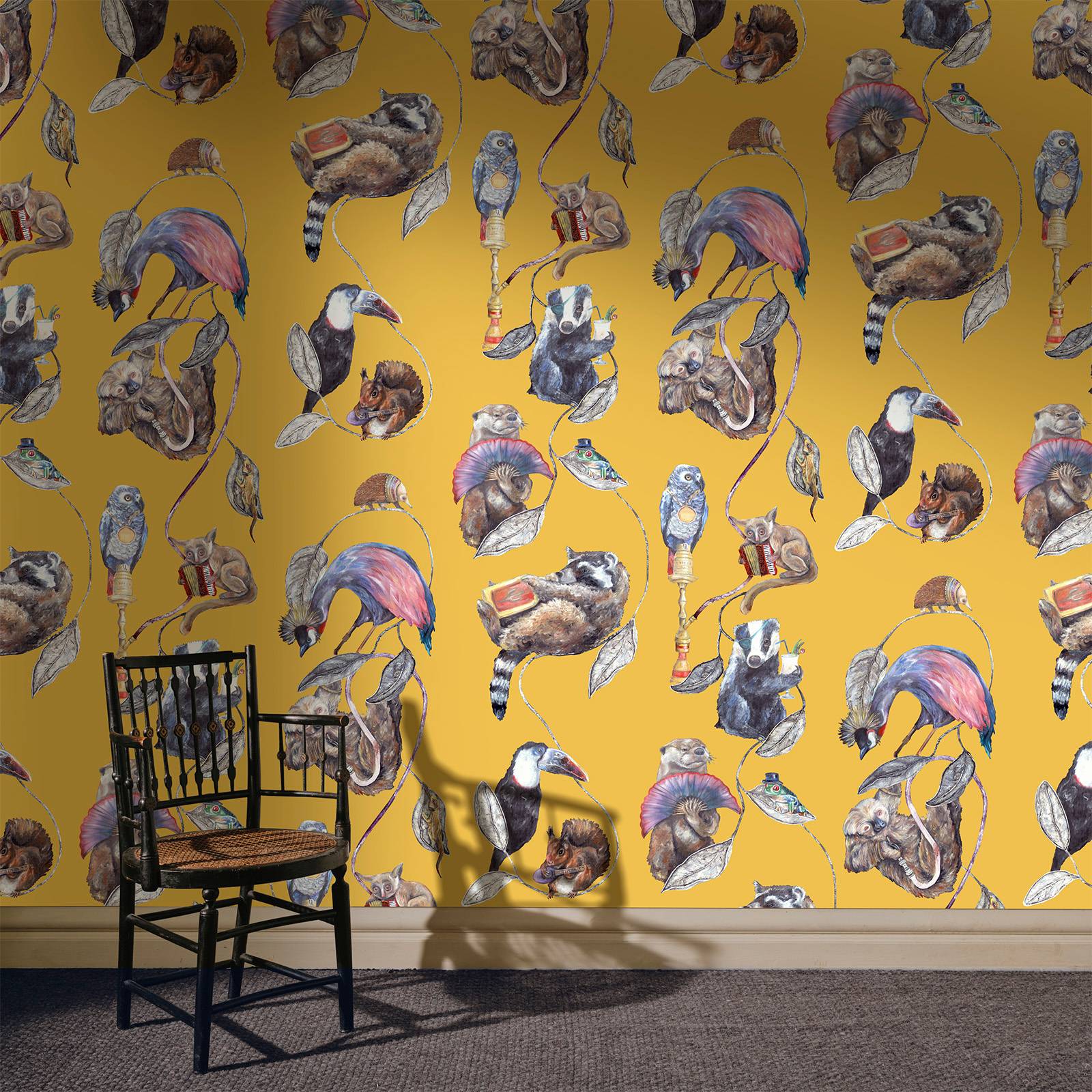 a chair in front of a wall with a pattern of birds