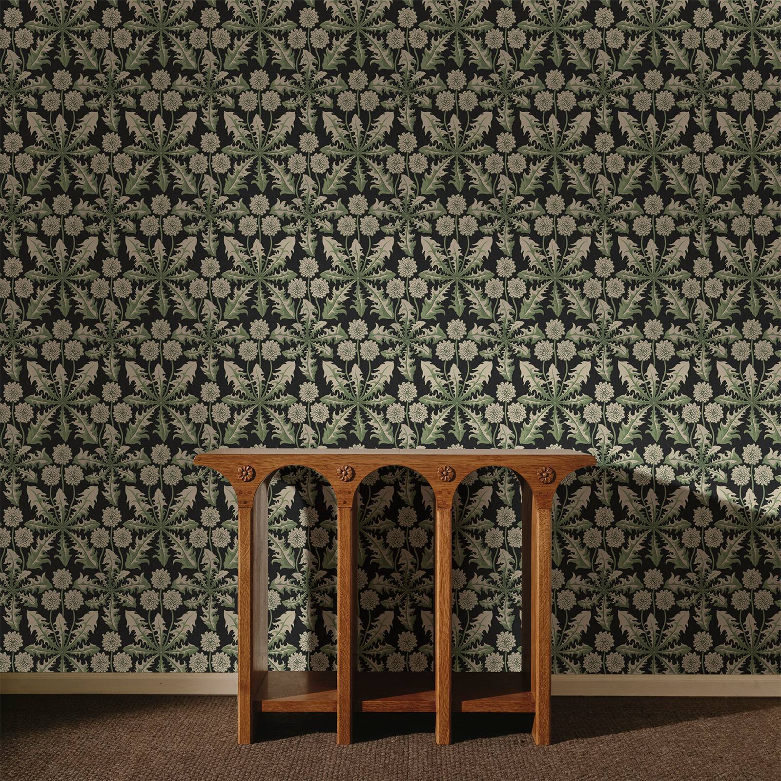 a wooden table in front of a wall